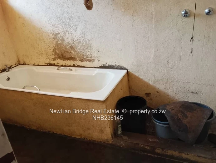 Norton 4-Bed Home with Gated Yard & Mango Trees