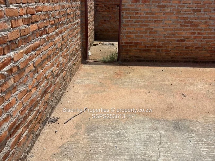 Incomplete brick retail shell on 300m² in  Murehwa