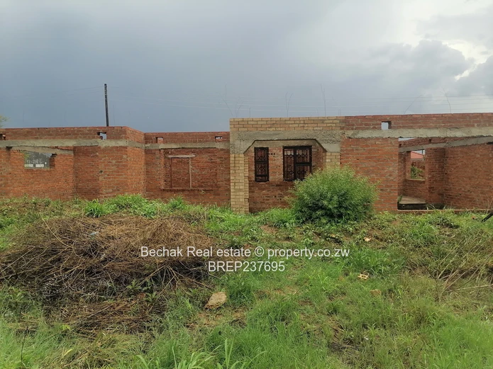 4-Bed Reigate Brick Shell on Main Road