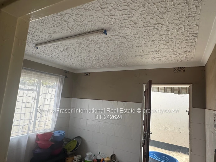 Unit L Seke 3 beds house with a cottage for sale