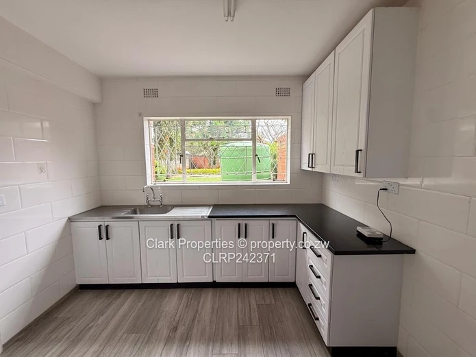 Secure 2-Bedroom Duplex with Solar & Water Backup