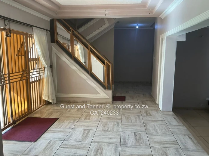 CHITUNGWIZA RIVERSIDE LOW DENSITY - Spacious Double Storey Home with 4 Solar Powered Modern Cottages