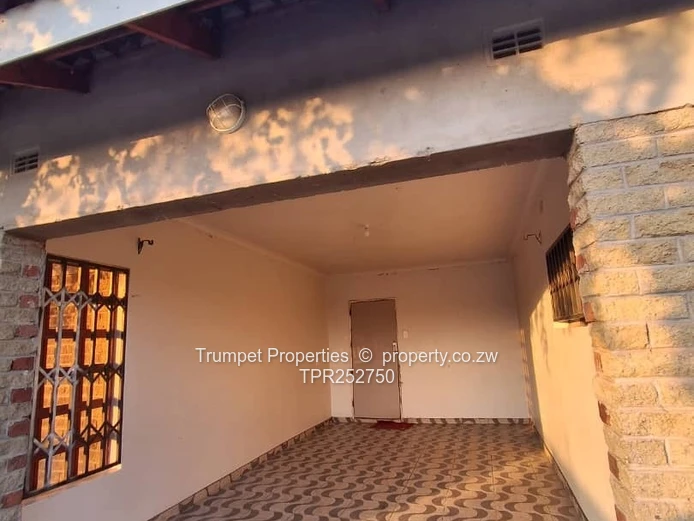 Spacious 7-Bed Home in Budiriro — Tank & Verandah