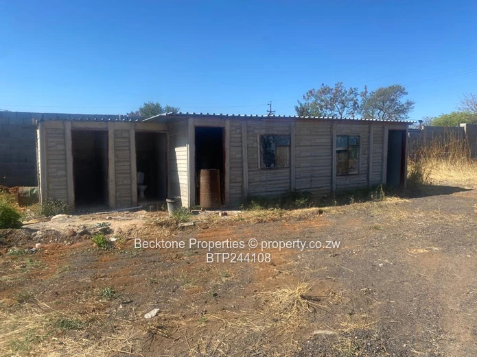 Spacious 2,420m² Walled Industrial Yard with Workshop — Bulawayo CBD