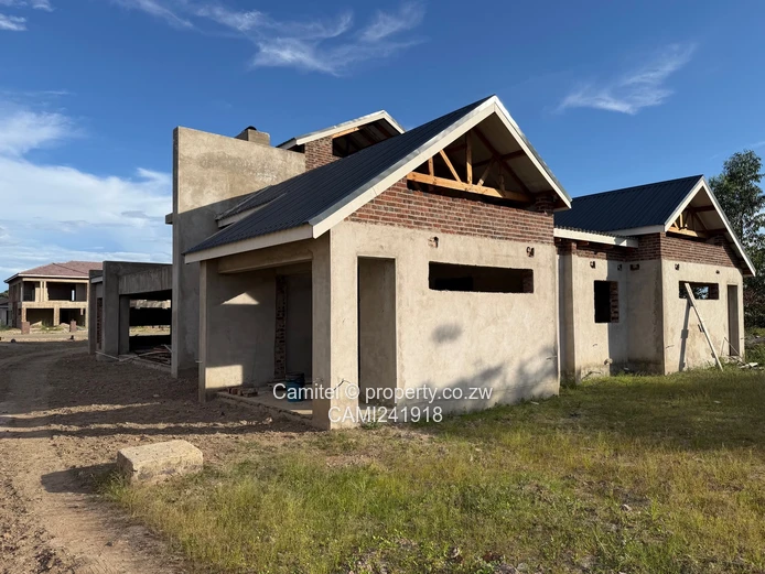 Incomplete 4 Bed double storey with a 3 bed cottage with title deed