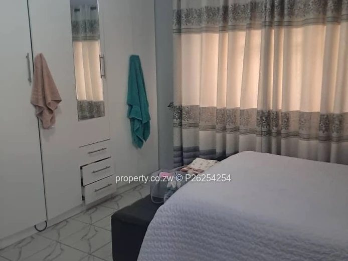 A four bedroomed house for sale in Mainway Meadows, Waterfalls in Harares