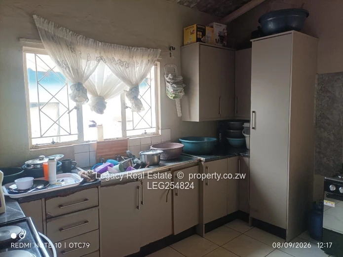 Cozy 3-Bed Warren Park Home with Borehole & Verandah (Sole Mandate)