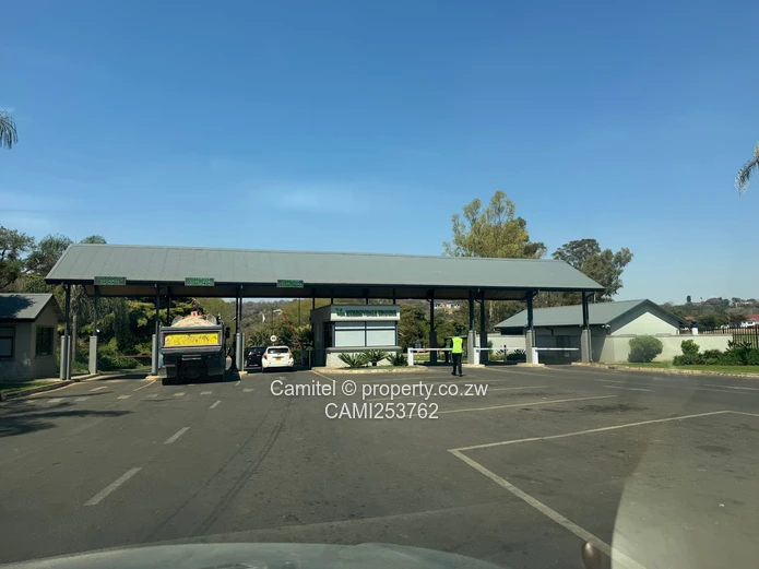 6005 sqm Stand, Borrowdale Brooke inside the boom gateTarred, Tree-Lined Main Road