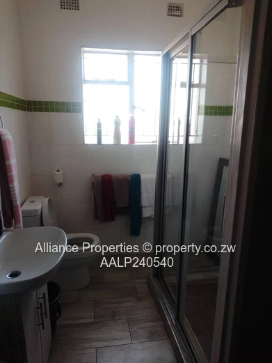 Spacious 4-Bedroom Home with Solar System on 450sqm – Walled & Gated