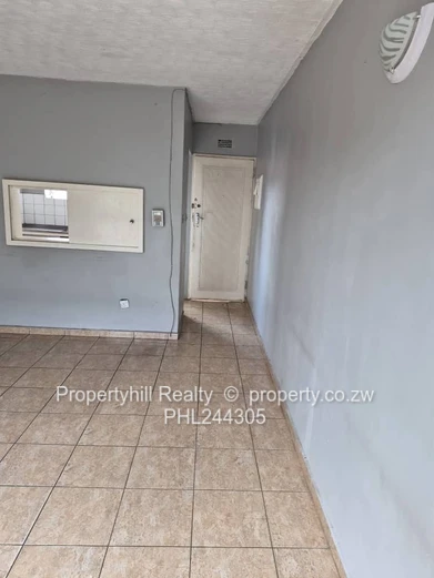 Harare CBD Avenues: 2-Bed Flat 80sqm — Borehole & Paved Yard (Sole Mandate)