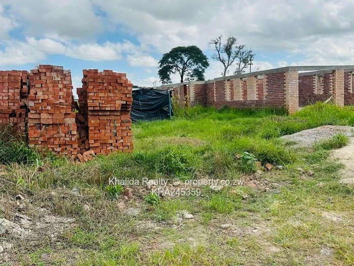 Mwashuma Park 1200sqm Stand With Bricks For Sale 