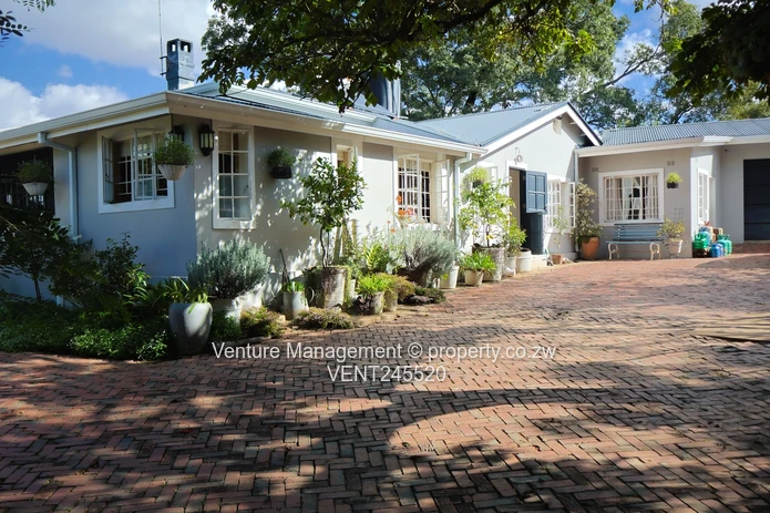 Elegant Estate Living on Expansive Grounds – Umwinsidale