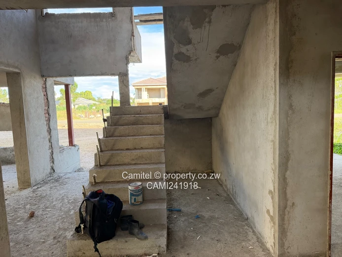 Incomplete 4 Bed double storey with a 3 bed cottage with title deed