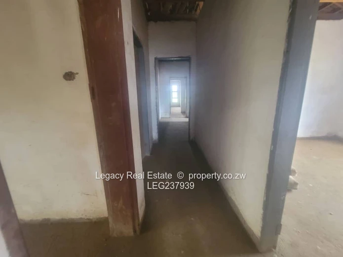 Prime Residential Plot with 4-Bedroom House to Complete