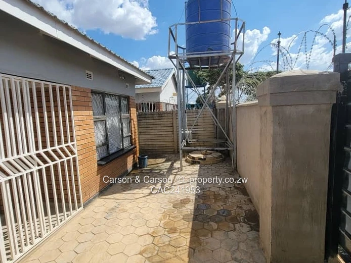 Secure 4-Bed Home with Borehole in Southlea Park