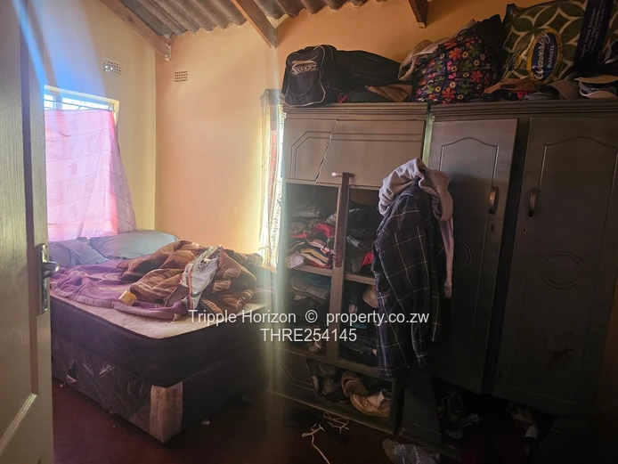 Chitungwiza unit O two houses for sale under one durawall 