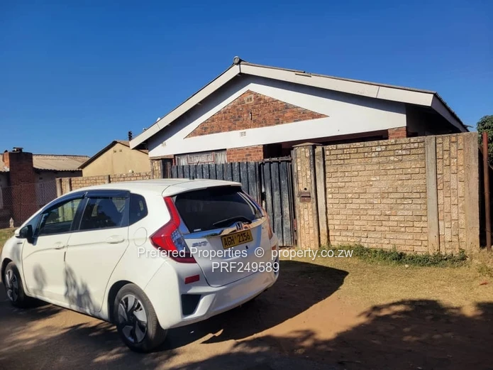 Walled 3-Bed Brick Home with Verandah in Kuwadzana