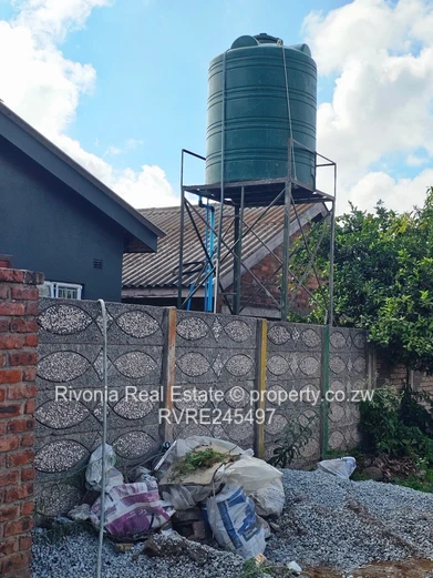 Budiriro 2BR/2BA  — Fresh Grey Interior & Secure main  Grills with 2 wings  