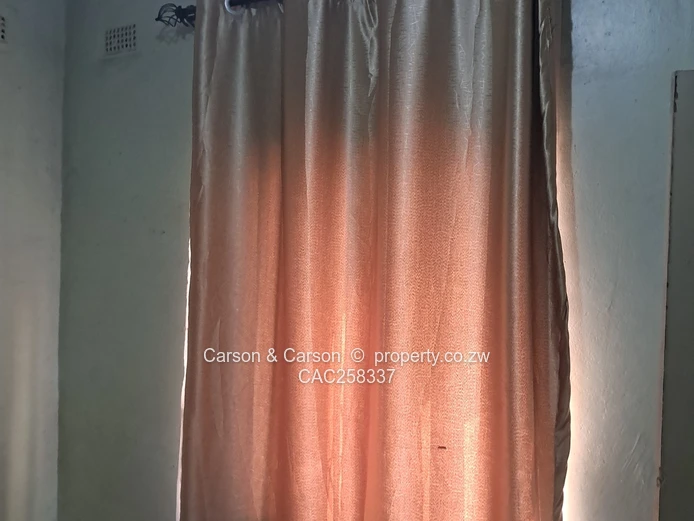 Mufakose 2 bedroom flat lounge fitted kitchen combined toilet and bathroom on ground floor 