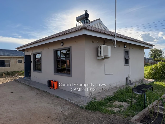 Incomplete 4 Bed double storey with a 3 bed cottage with title deed