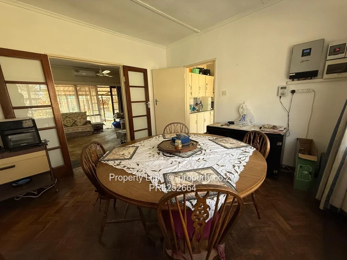 Double Entrance Corner Property With Potential!