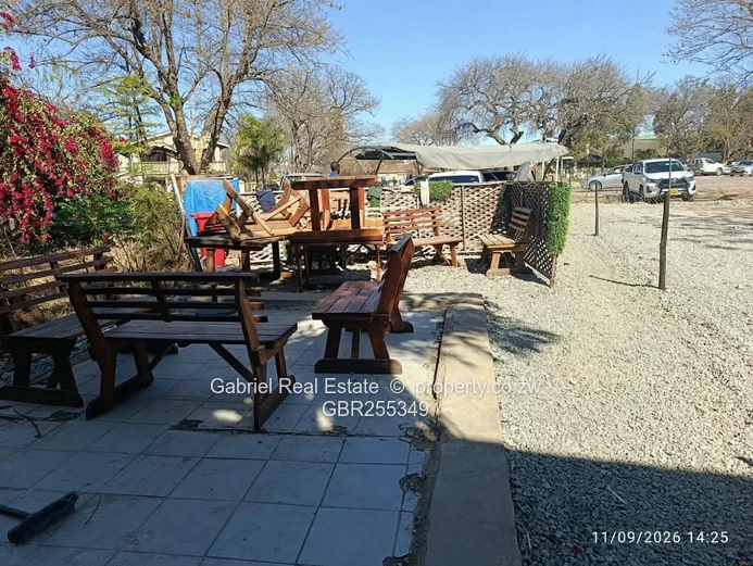 Prime Masvingo CBD Office/flat currently being used as a Driving school, Car wash and restaurant.