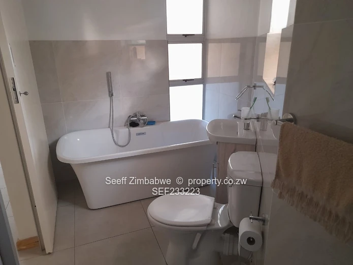 Avondale West Gem: Spacious Family Living with Cottage and Abundant Water Supply!