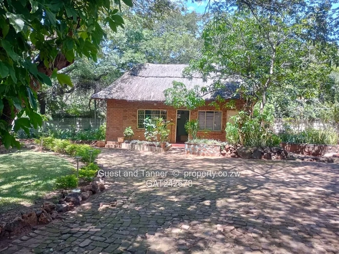 Ten bedroomed lodge under thatch for sale 