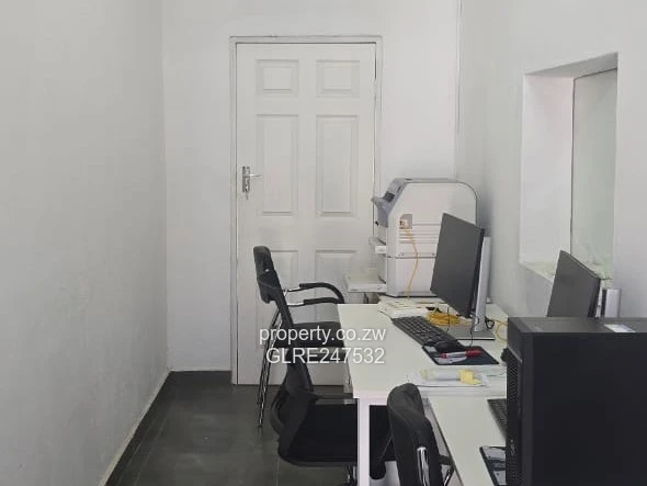 Harare CBD Office: Secure Walled Property with Paved Yard