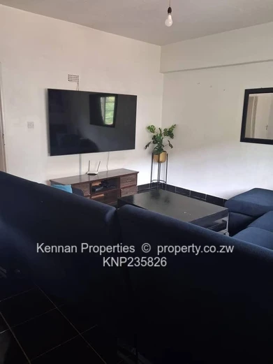 Secure 2-bedroom flat close to Avenues Hospital and Shops.