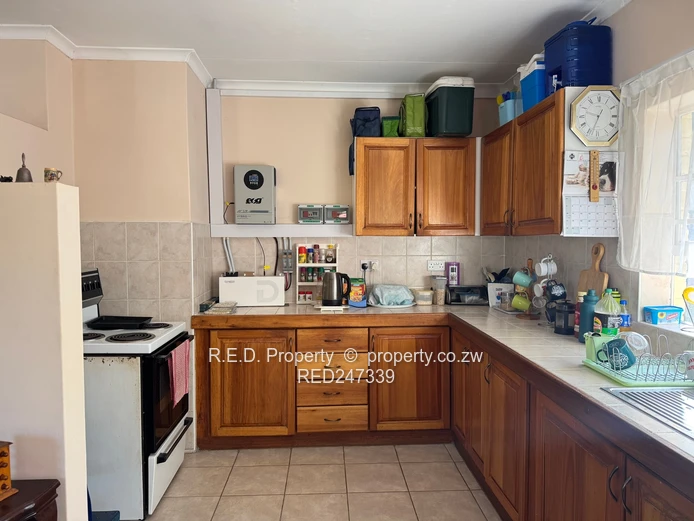 Secure, Comfortable Townhouse Living In Suburbs!