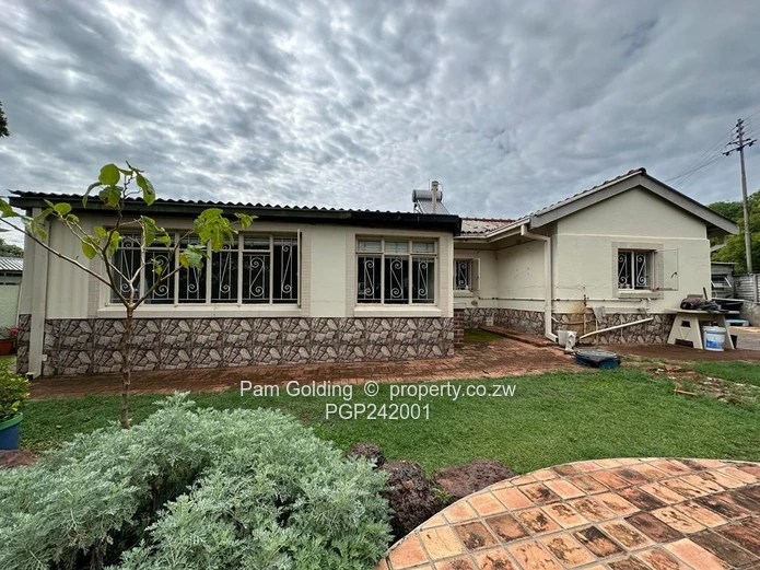 Charming, Compact Residence Set On Spacious Land