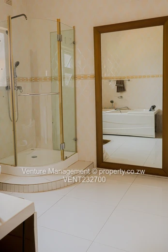 Immaculate 6 Bedroom Mansion with Cottage, Pool & Solar!