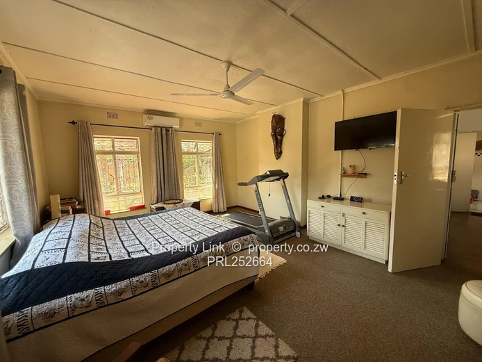 Double Entrance Corner Property With Potential!