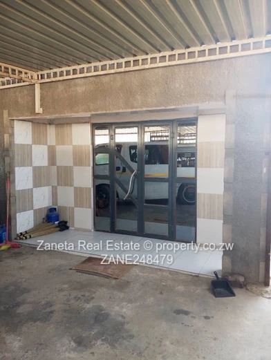 4-Bed, 2-Bath Manyame Park Home — Tiled Hallway & Carport