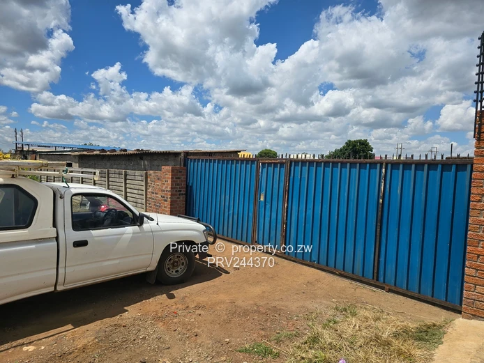 Negotiable Price. Walled & Gated 1,750m² Industrial PLot in Tynwald