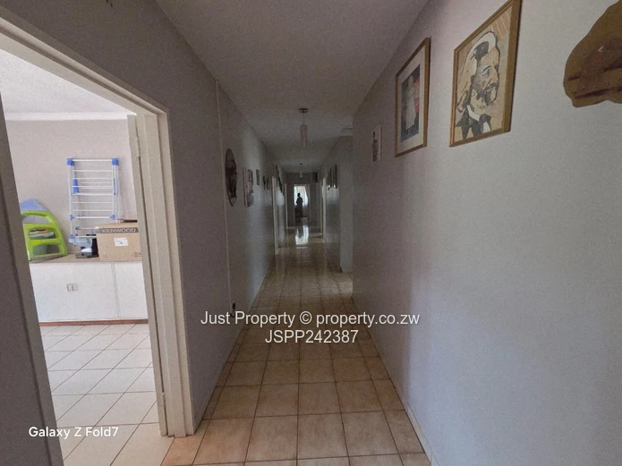 Borrowdale Road Frontage House sitting on 4008sqm