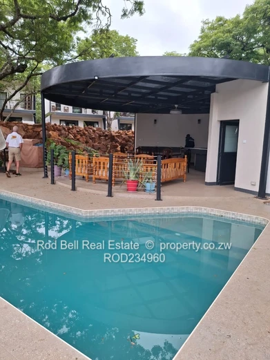 Chisipite 2-Bed Townhouse — Pool, Garden & Balcony