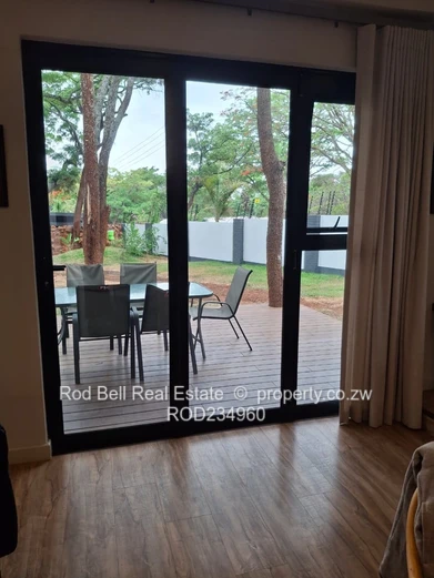 Chisipite 2-Bed Townhouse — Pool, Garden & Balcony