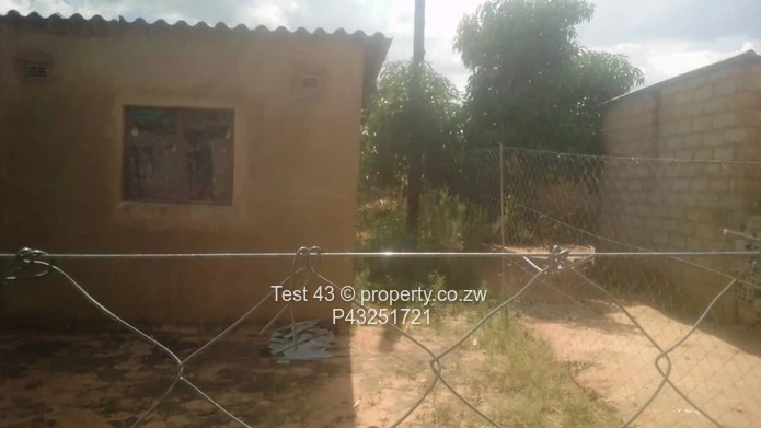 Unfinished 2-Bed Home with Fenced Yard in Chitungwiza