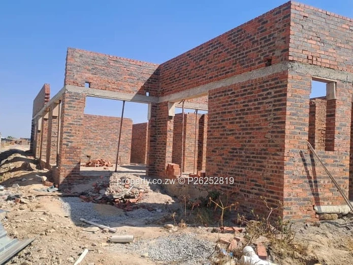 An lncomplete 4 bedroomed house left with finishings for sale in Arlington East , Harare  
