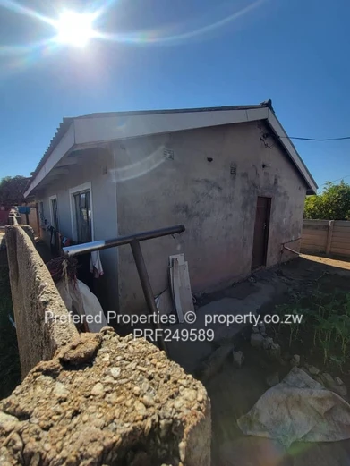 Walled 3-Bed Brick Home with Verandah in Kuwadzana