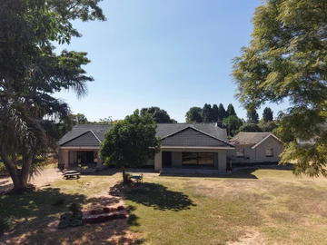 Solid House On Corner Stand With Great Potential
