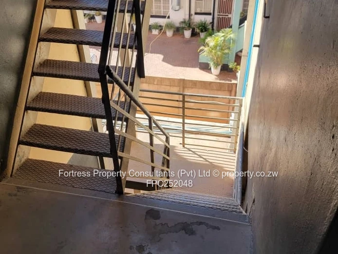 Sunlit 2-Bed Flat in Avenues CBD — Borehole (Sole Mandate)