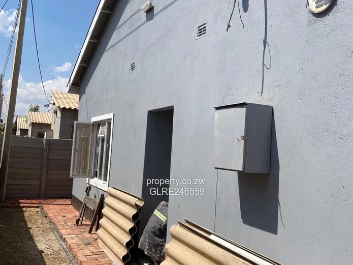 For Sale 4-Bed 2 Apartments Townhouse Complex in Budiriro Cabs  - Walled, Paved, Fitted Kitchens