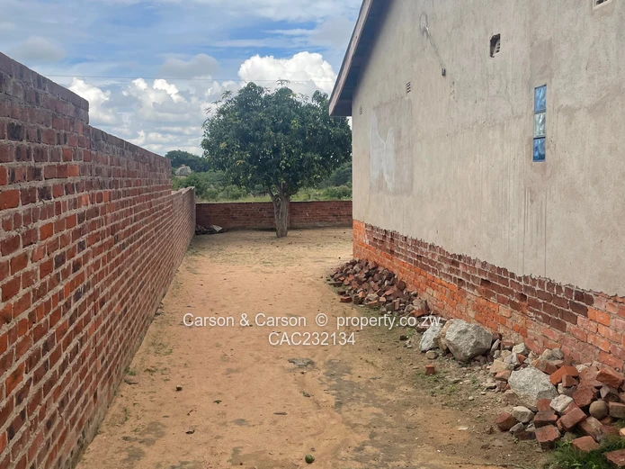 Walled 3-Bed Home with Verandah & Main Road Frontage