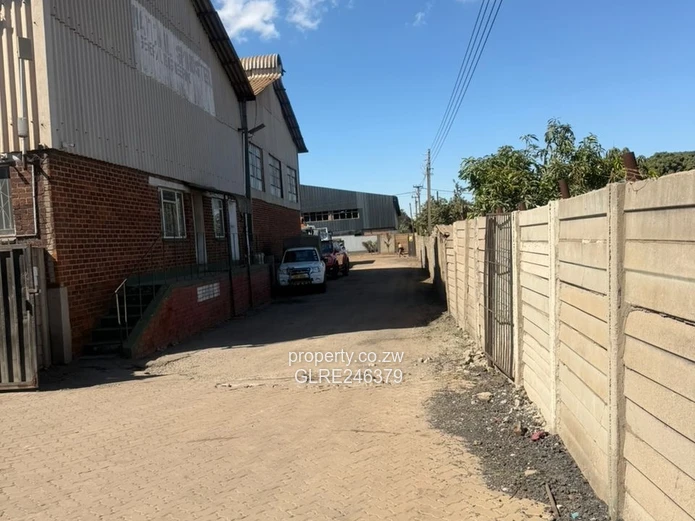 360sqm Ardbennie Warehouse for Rent — Roller Doors & Borehole