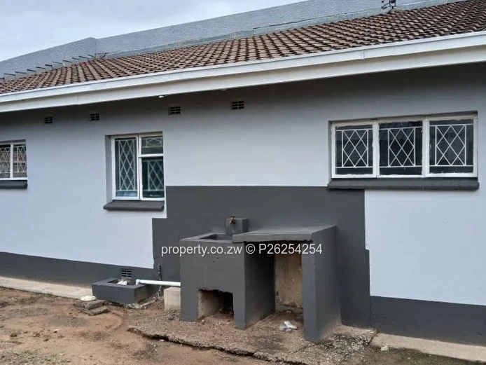A four bedroomed house for sale in Mainway Meadows, Waterfalls in Harares