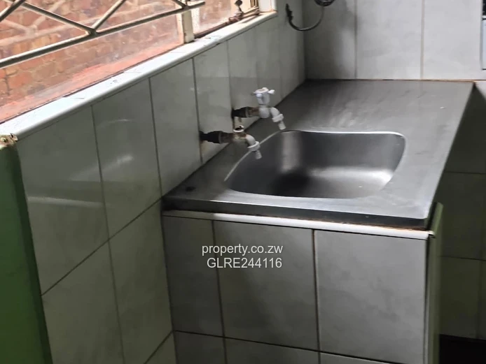 Tiled 2-Bed Kuwadzana Home — Borehole & Parking