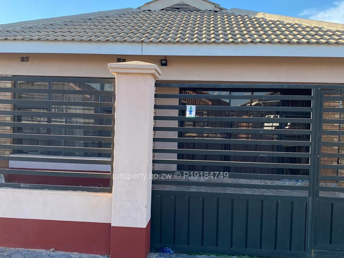 3-Bed Walled Home, Tiled Roof & Secure Gate — Aspindale
